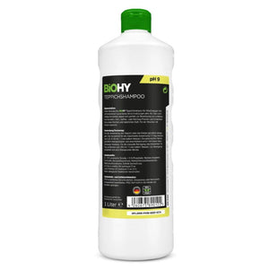 Teppichshampoo in weißer Flasche mit grünem Deckel von hinten