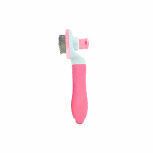 Pink weisse TierhaarentfernungsbĂĽrste mit Knopf hinten von der Seite