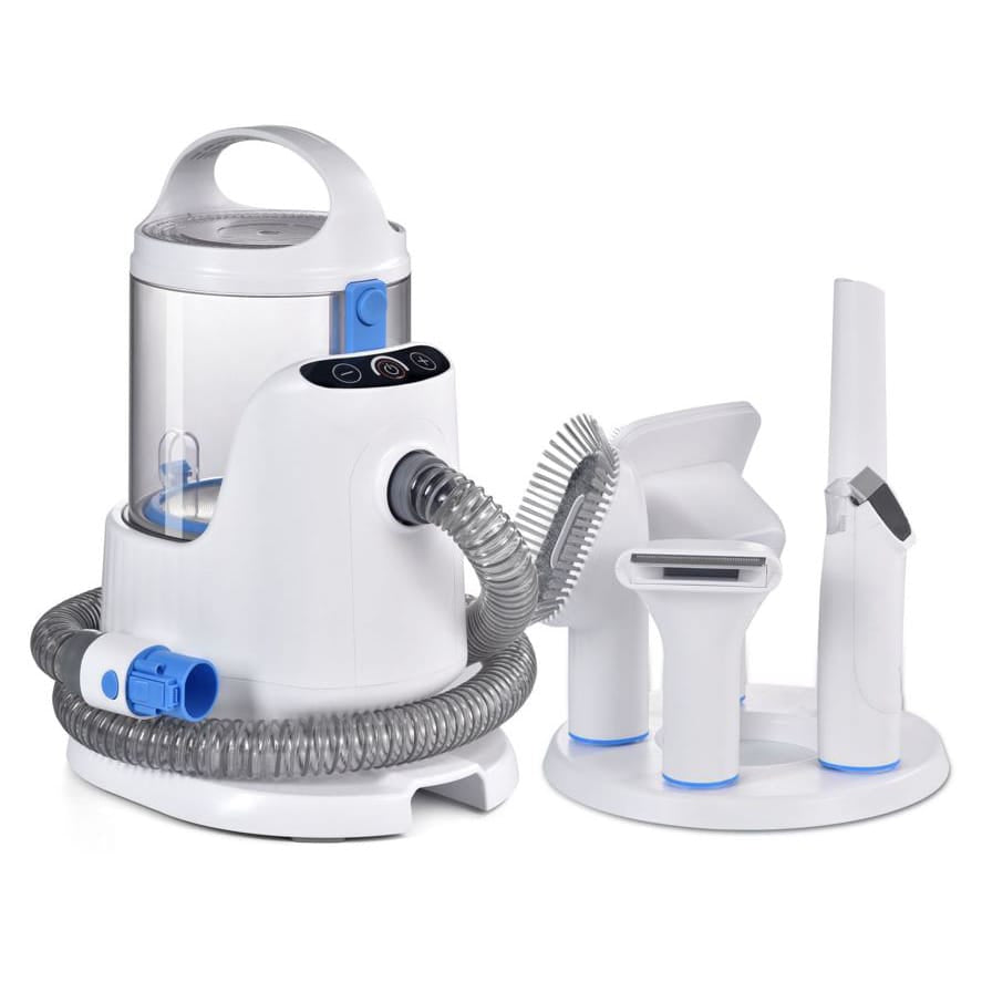 Weisse Hundeschermaschine mit weissem Tierhaar-Staubsauger