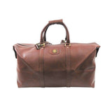 Braune Lederreisetasche mit goldenen Details 