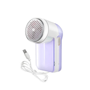 Lila-weisser Fusselentferner mit weissem Ladekabel