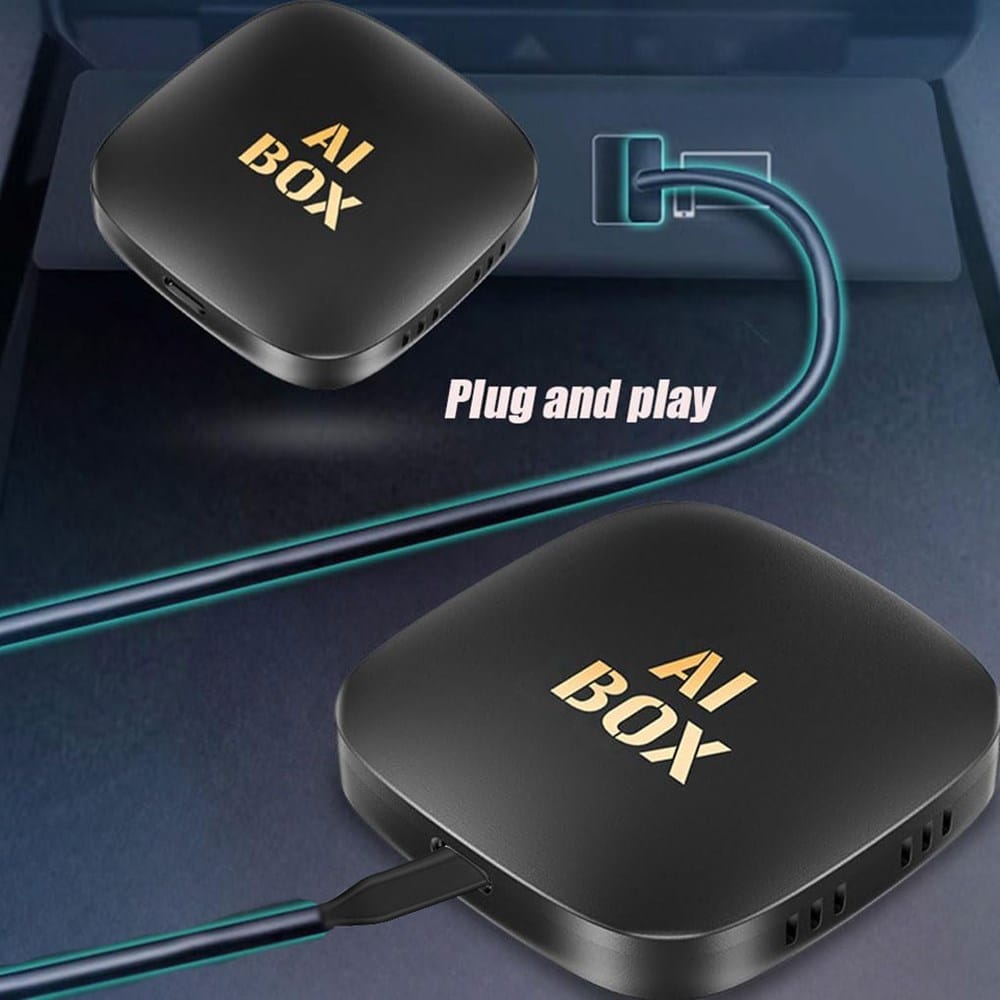 Schwarzer Wireless Carplay-Adapter mit "AI Box" Aufschrift und kleiner Anleitung